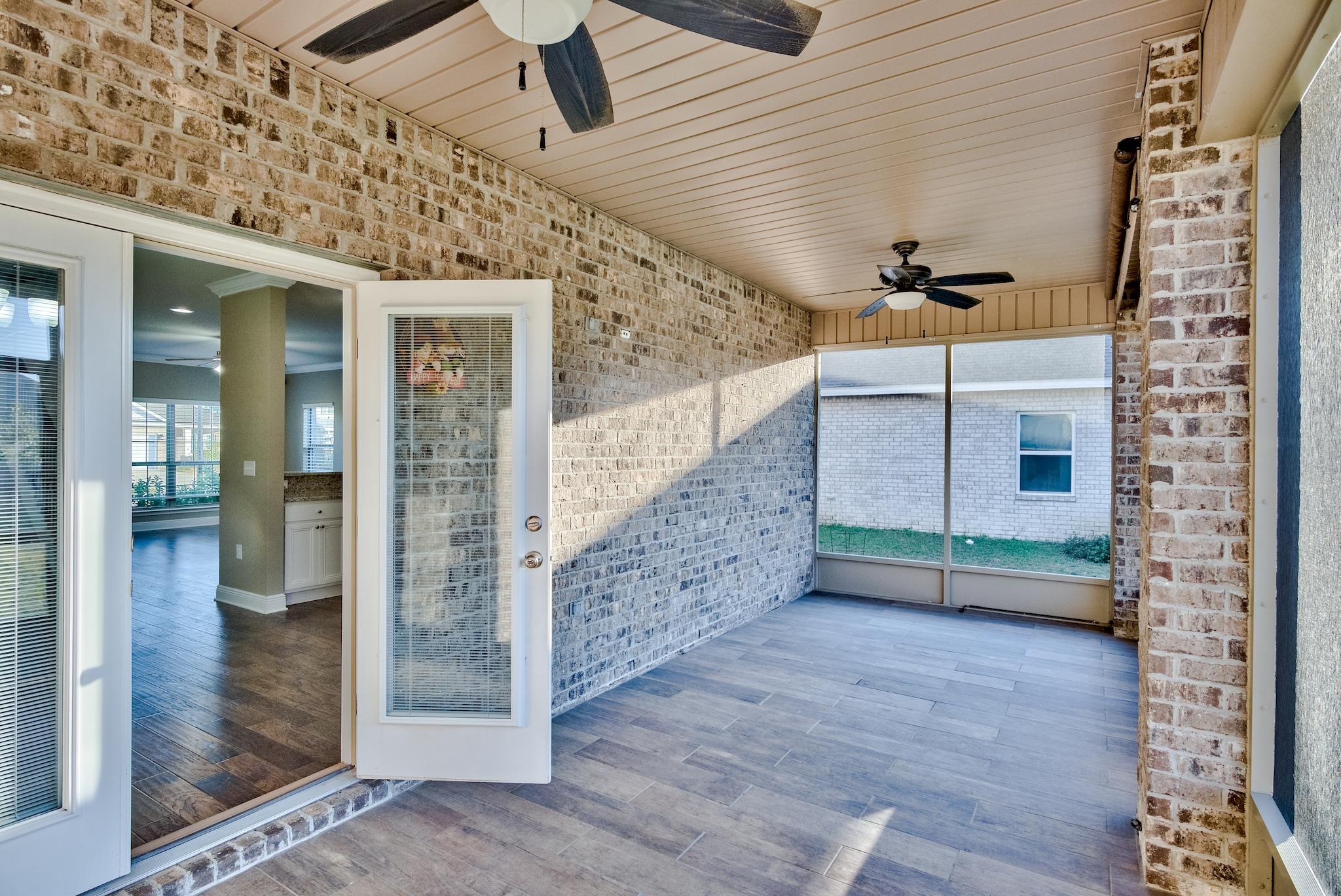 242 Pin Oak Loop Santa Rosa Beach, FL 32459 - Photo 29 of 43 a view of a porch