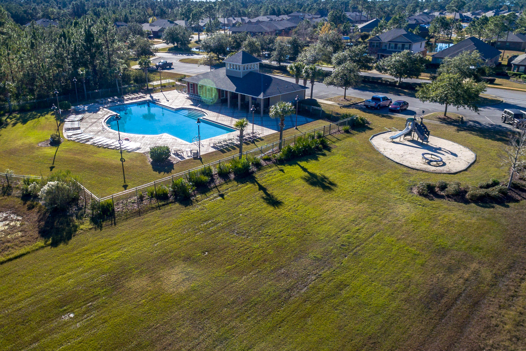 242 Pin Oak Loop Santa Rosa Beach, FL 32459 - Photo 34 of 43 an aerial view of a house with swimming pool and outdoor seating