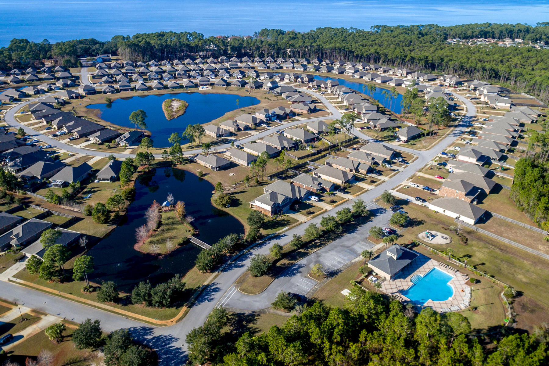 242 Pin Oak Loop Santa Rosa Beach, FL 32459 - Photo 43 of 43 an aerial view of residential houses with outdoor space