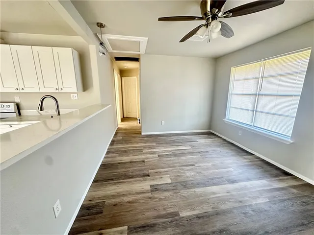 a view of an entryway with a workspace