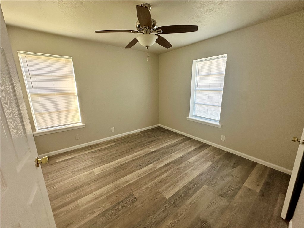 2552 Ave B Ingleside, TX 78362 - Photo 8 of 10 a view of an empty room with a window