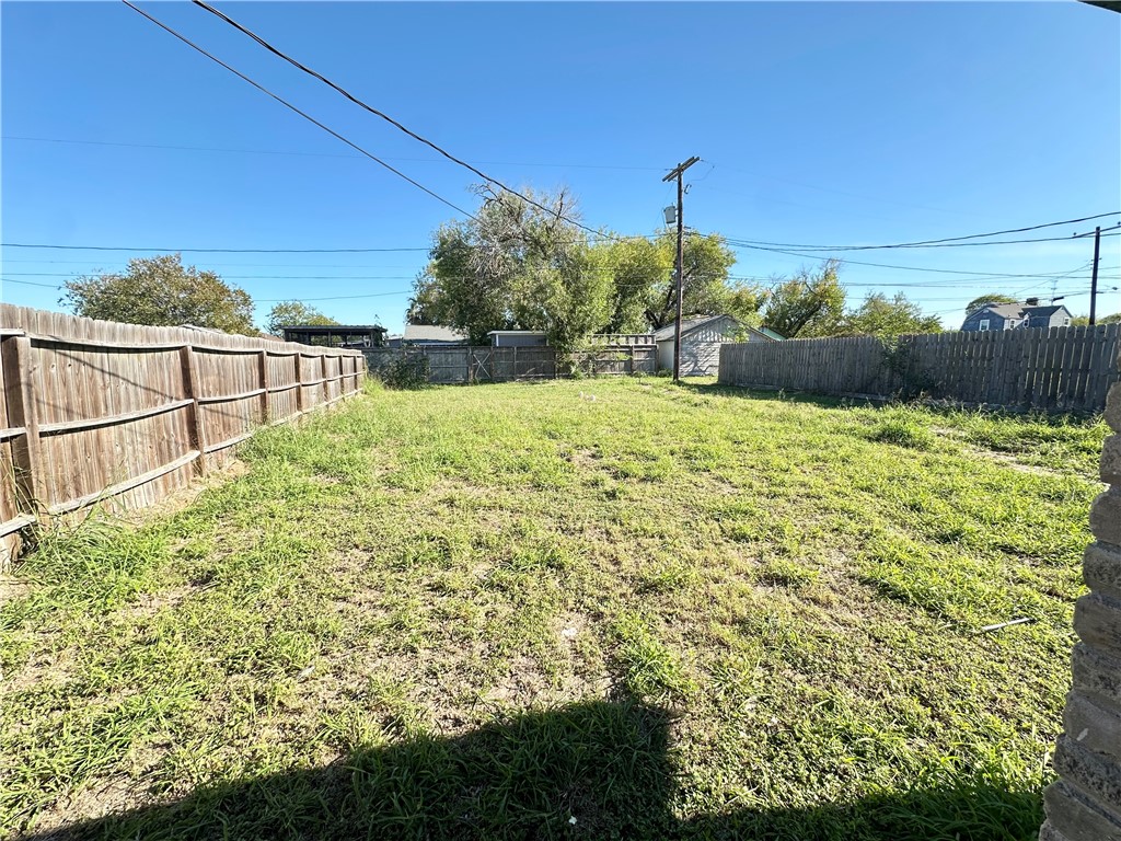 2552 Ave B Ingleside, TX 78362 - Photo 10 of 10 a view of a garden with a building in the background