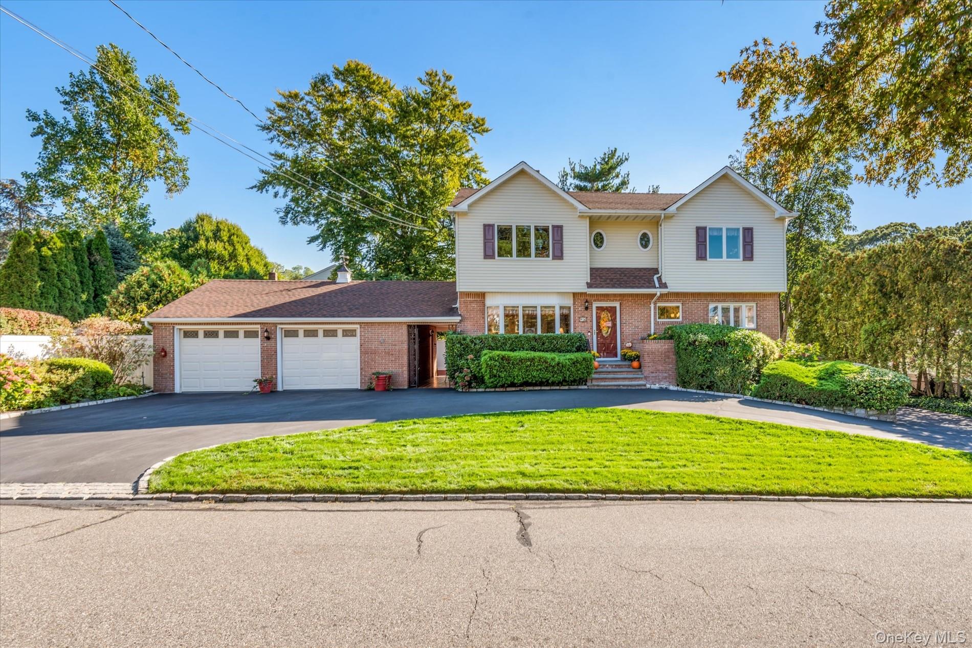 18 Violet Road Bayville, NY 11709 - Photo 1 of 1 a house with a garden in front of it
