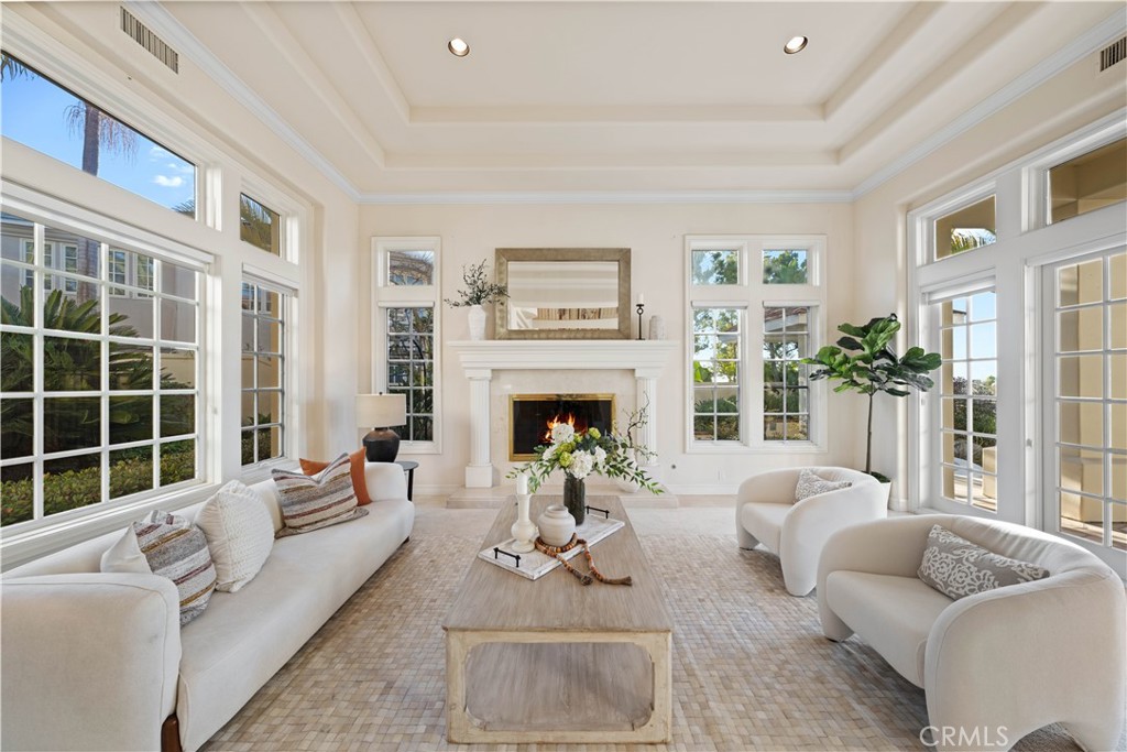 17 Pemberly Irvine, CA 92603 - Photo 11 of 60 Living room with fireplace