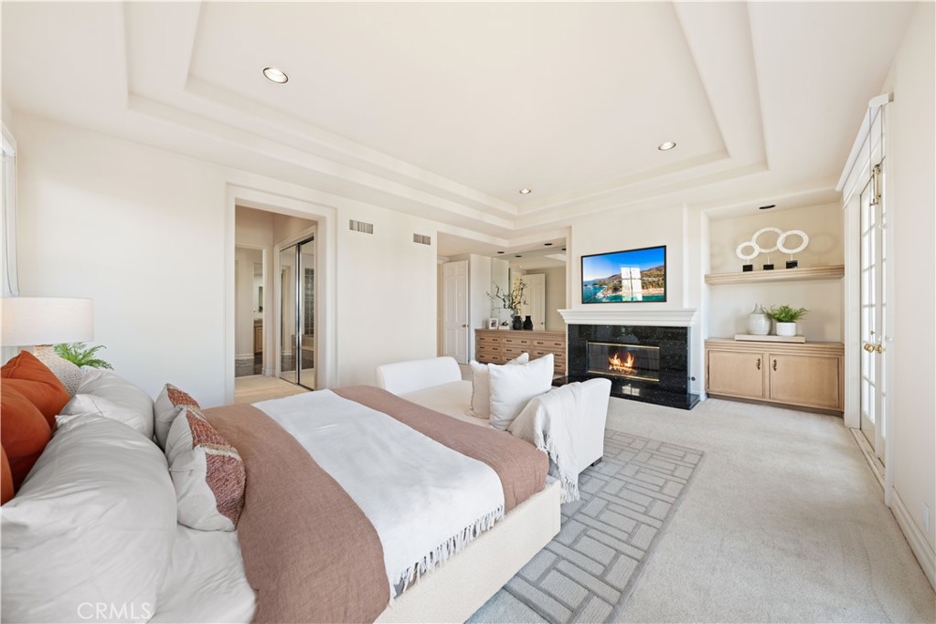17 Pemberly Irvine, CA 92603 - Photo 27 of 60 master bedroom with fireplace