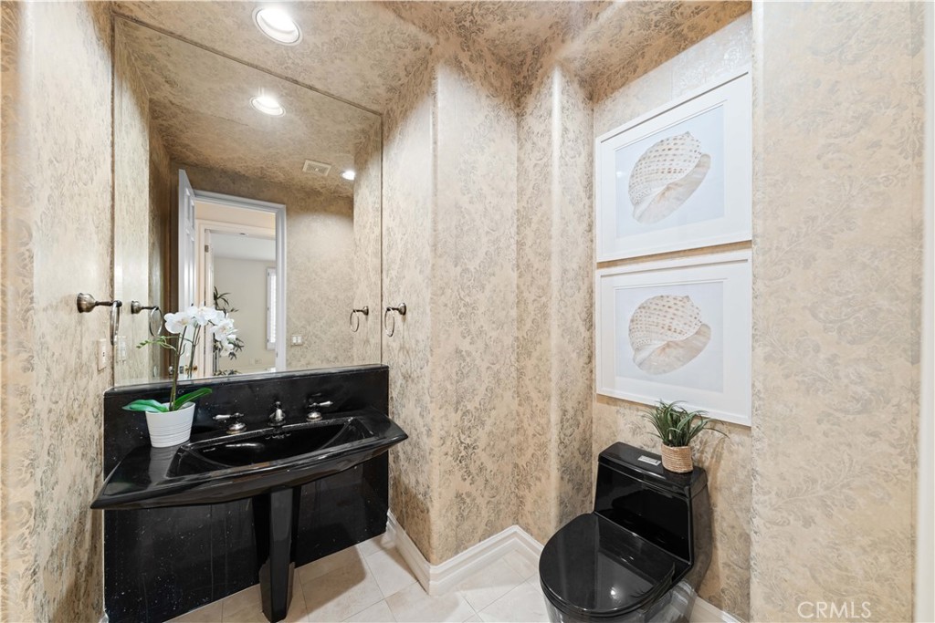 17 Pemberly Irvine, CA 92603 - Photo 44 of 60 half bathroom on the first floor