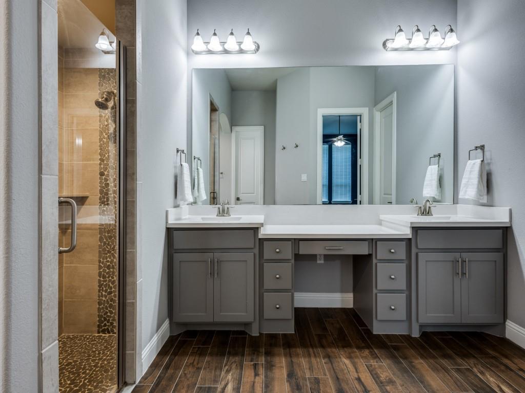 3422 Secretariat Place Celina, TX 75009 - Photo 19 of 28 a bathroom with a sink and a mirror