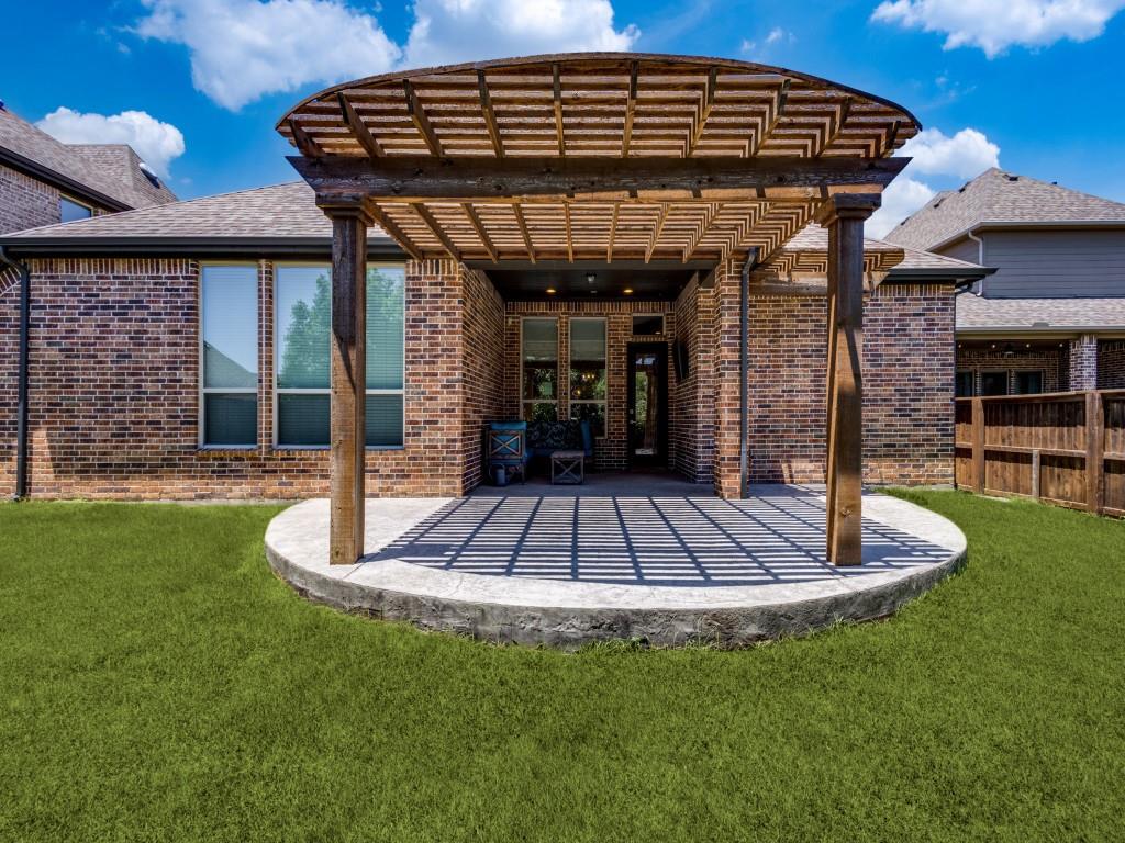 3422 Secretariat Place Celina, TX 75009 - Photo 25 of 28 a front view of a house with a yard