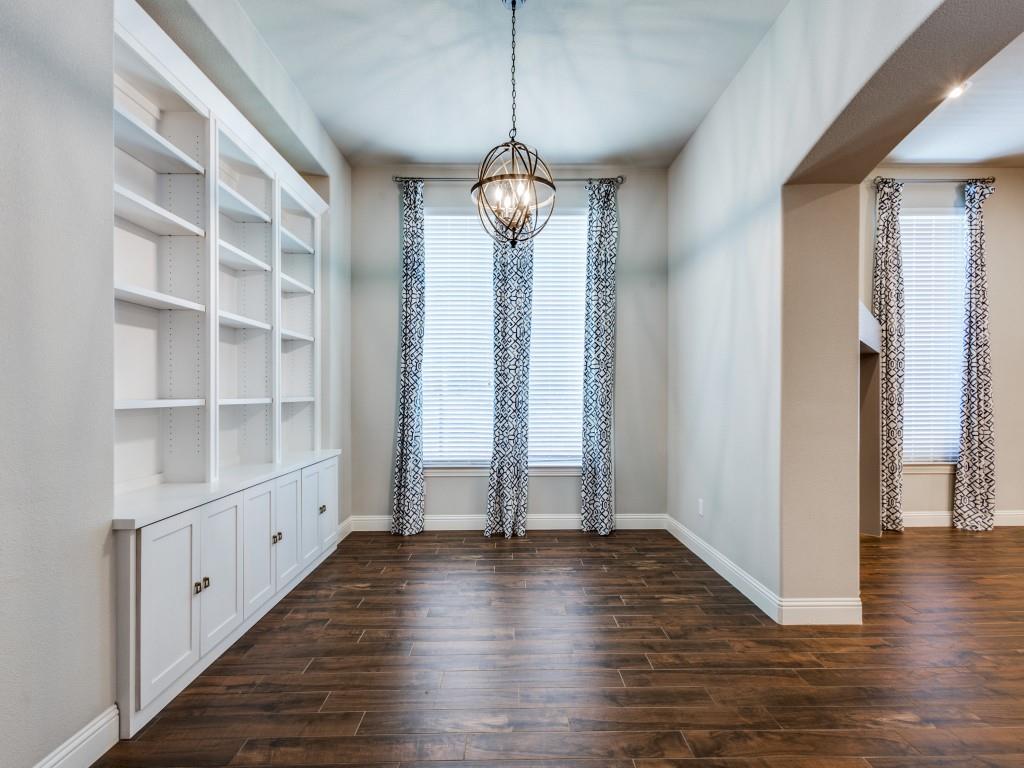 3422 Secretariat Place Celina, TX 75009 - Photo 6 of 28 a view of a room with wooden floor staircase and a window