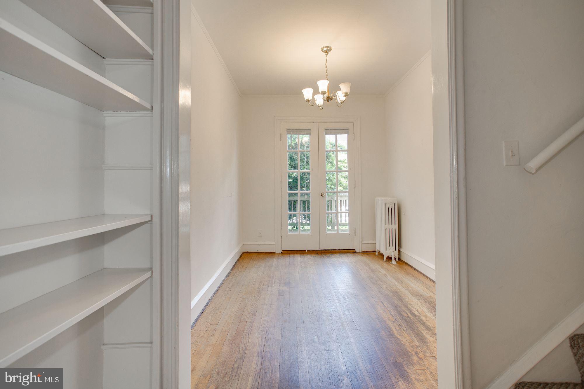 1706 37th Street Northwest Washington, DC 20007 - Photo 5 of 11 Dining room with French doors leading to deck