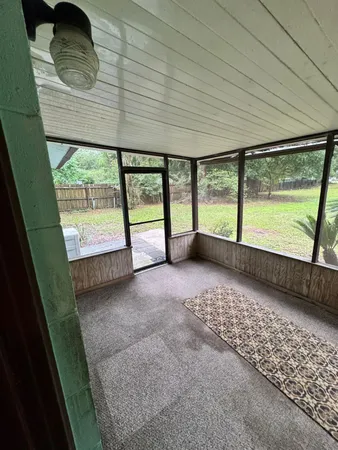 a view of a backyard of a house