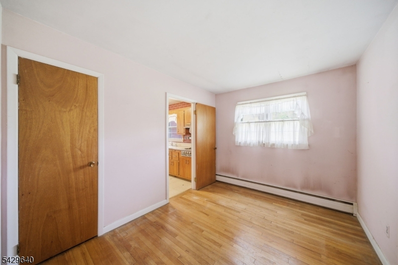 49 Heather Hills Drive Oak Ridge, NJ 07438 - Photo 17 of 34 an empty room with windows