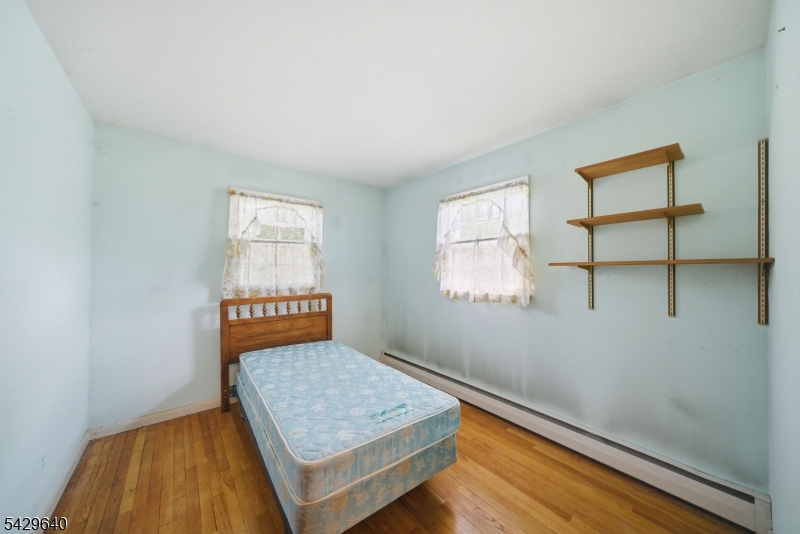49 Heather Hills Drive Oak Ridge, NJ 07438 - Photo 21 of 34 a view of an empty room and window