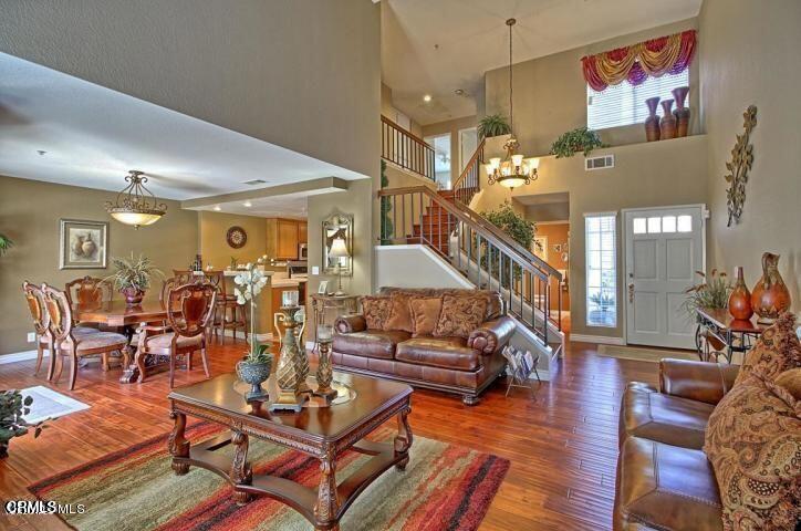 508 Niveo Lane Oxnard, CA 93030 - Photo 2 of 3 a living room with lots of furniture and wooden floor