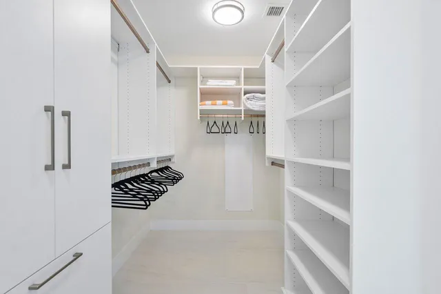 a bathroom with a bathtub and a sink