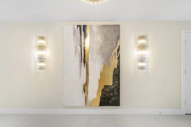 an aerial view of city and lake