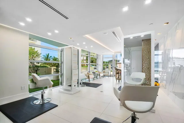 an entryway and livingroom with furniture
