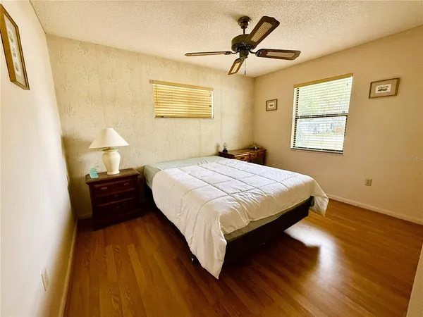 a view of a room with gym equipment and pool table
