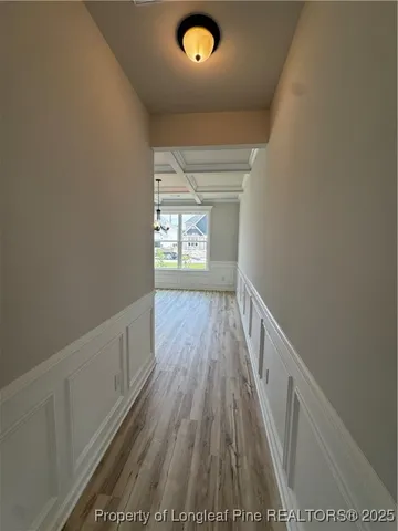 a view of entryway with wooden floor