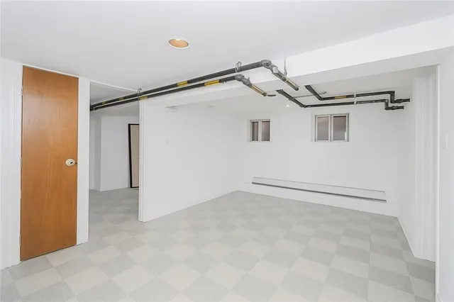 a view of a hallway with a window