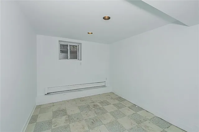 a view of a big room with white walls