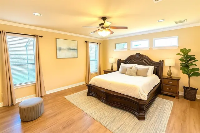 a view of a livingroom with furniture nad wooden floor