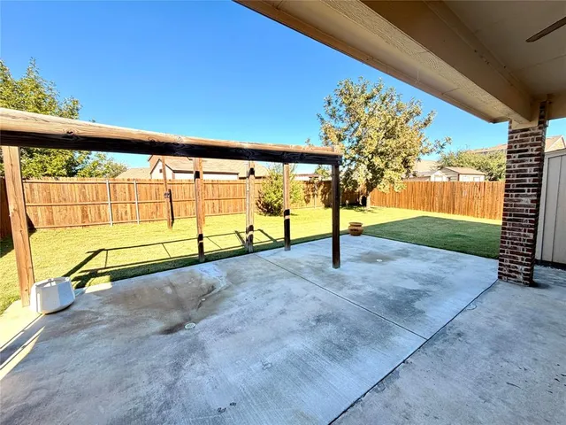 a bathroom with a tub sink vanity and a mirror