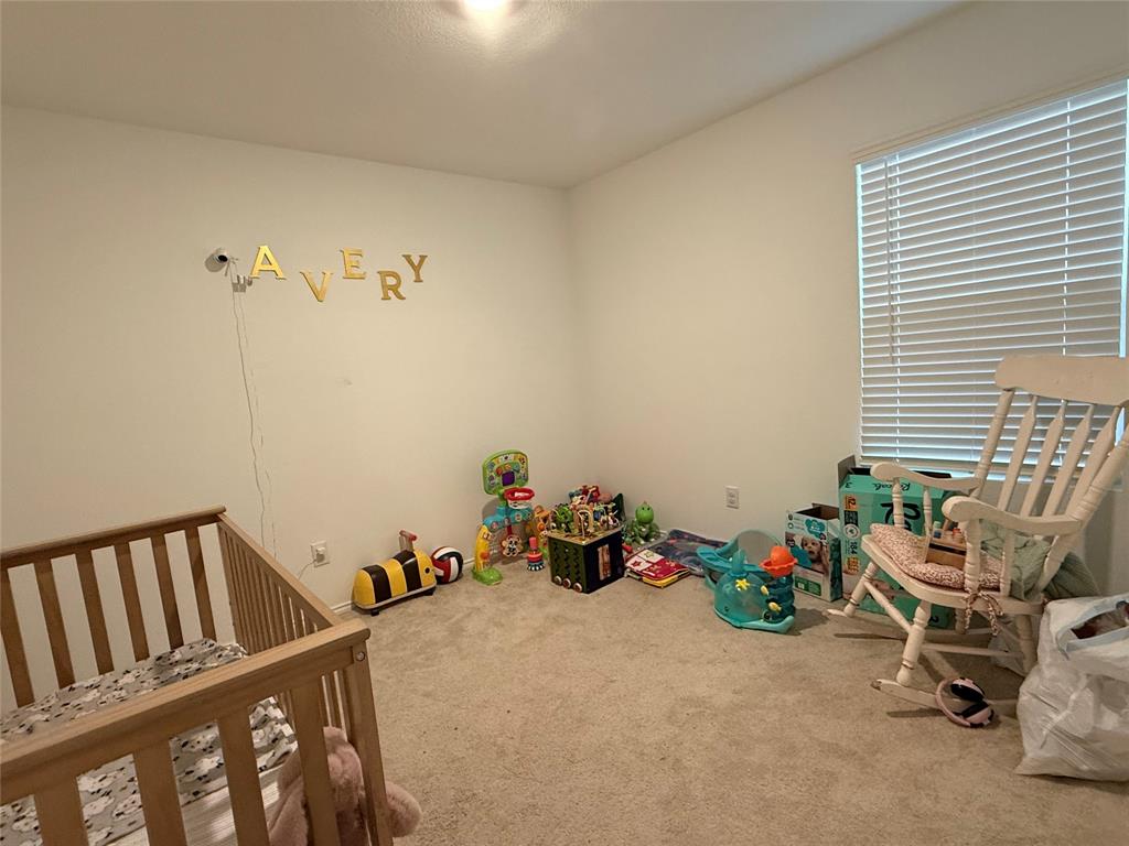 330 Ashbrook Way Princeton, TX 75407 - Photo 9 of 11 a room with toys and toys