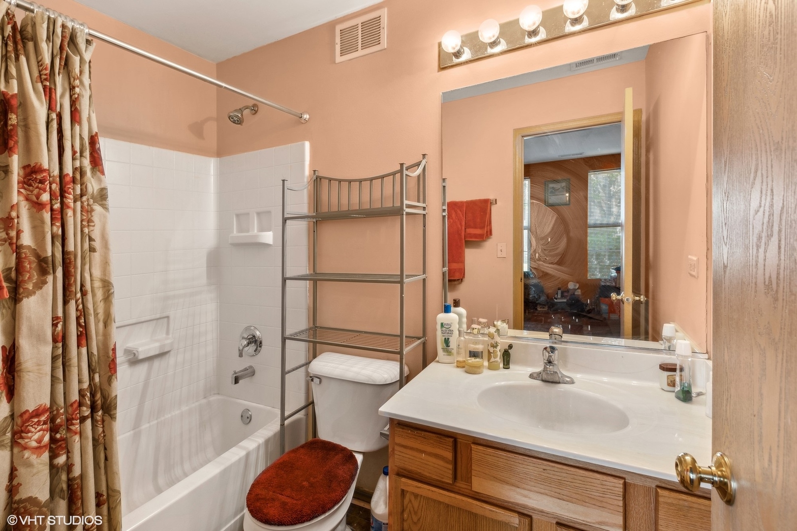 657 Serendipity Drive Aurora, IL 60504 - Photo 12 of 13 a bathroom with a sink and a mirror