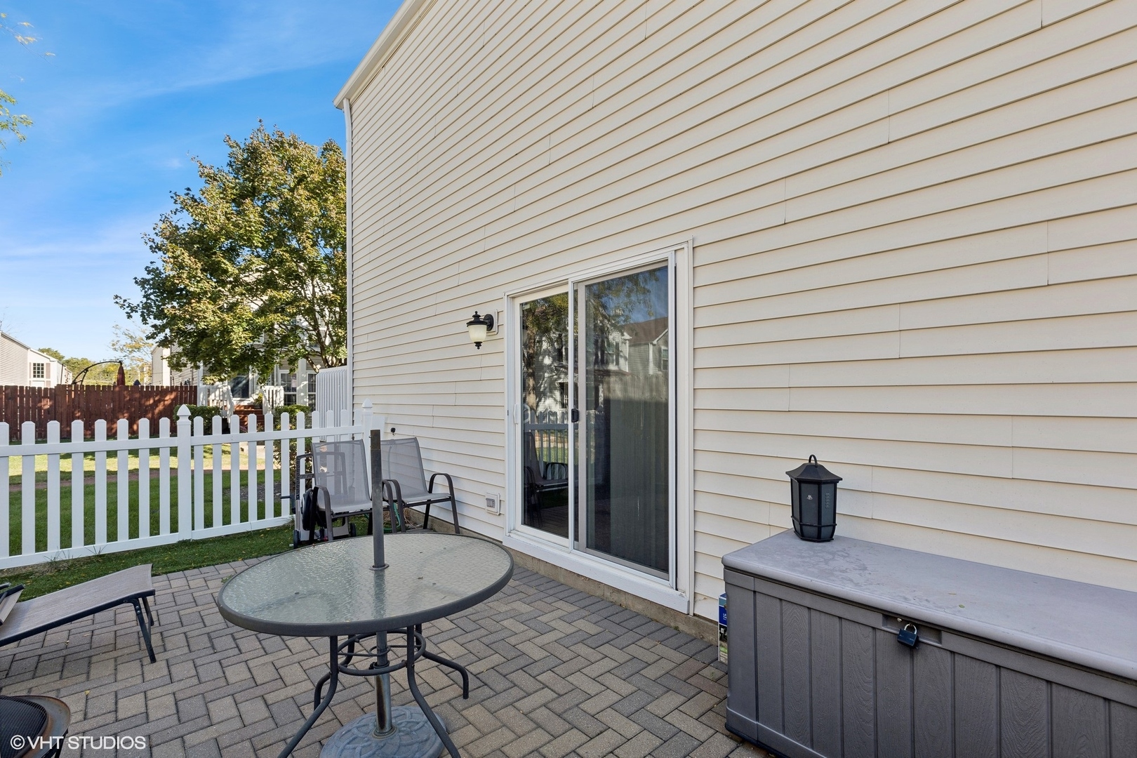 657 Serendipity Drive Aurora, IL 60504 - Photo 13 of 13 a view of a chair and table in the balcony