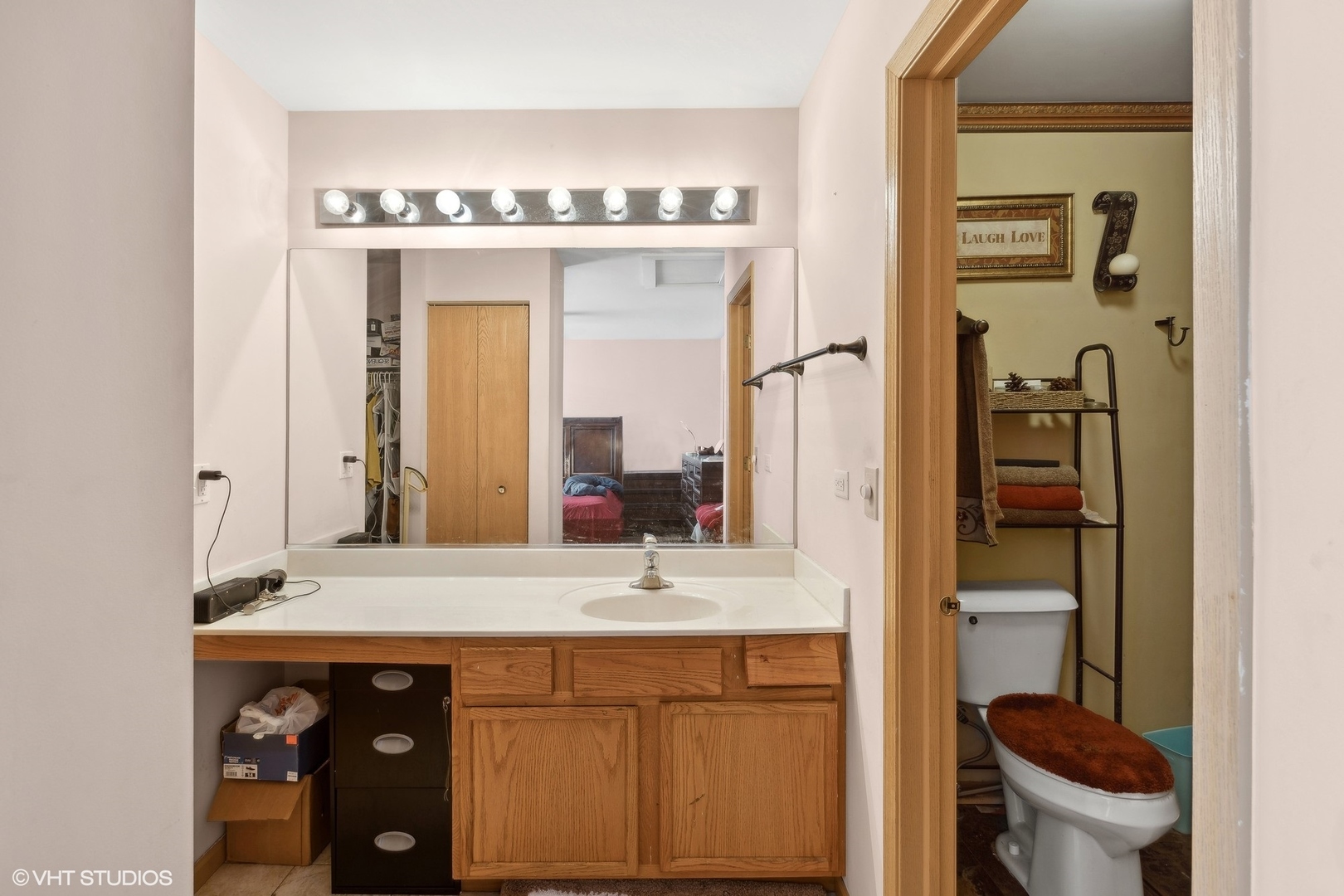 657 Serendipity Drive Aurora, IL 60504 - Photo 7 of 13 a bathroom with a sink and a mirror