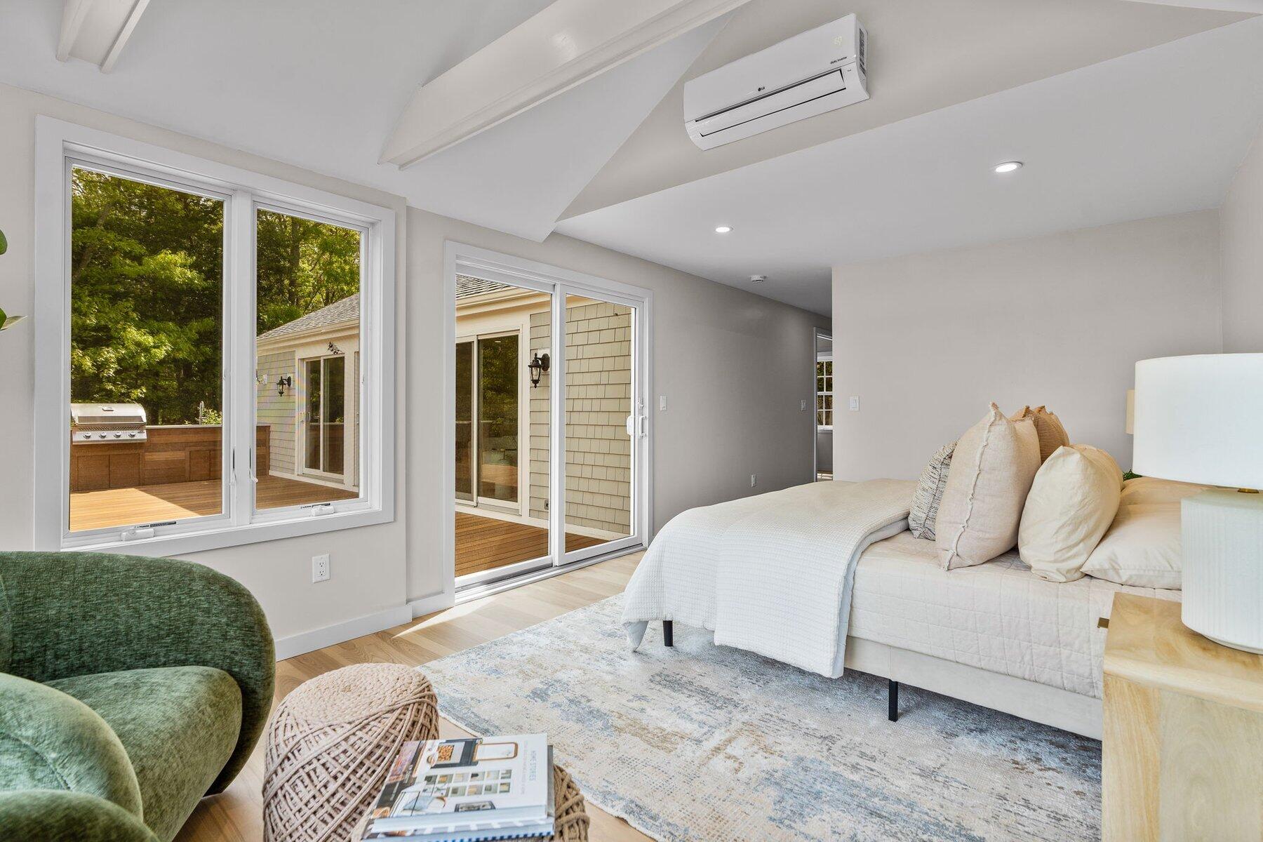 162 Main Street Osterville, MA 02655 - Photo 24 of 50 a bedroom with a bed and glass window