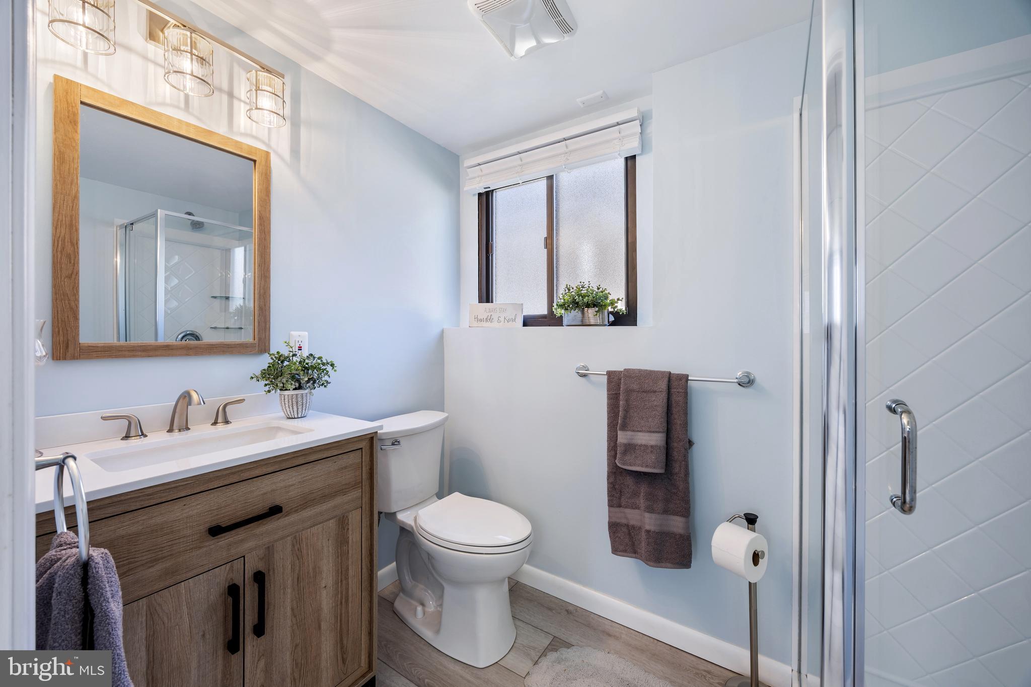 802 Waterview Drive Curtis Bay, MD 21226 - Photo 47 of 70 bathroom w/ a stylish vanity w/ wood cabinetry...