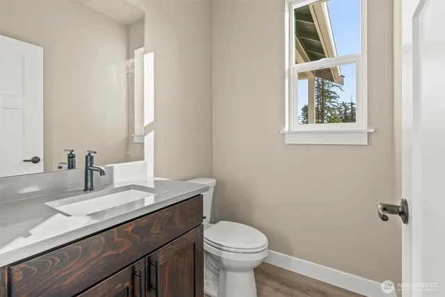 a bathroom with a sink and a toilet