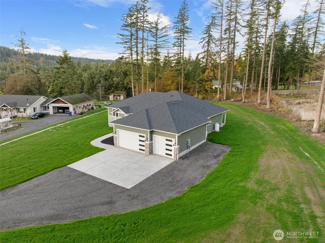 a house view with a garden space