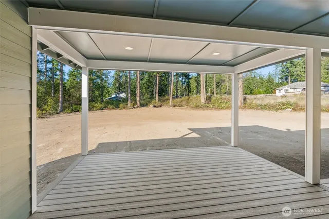 a bathroom with a vanity and a large window
