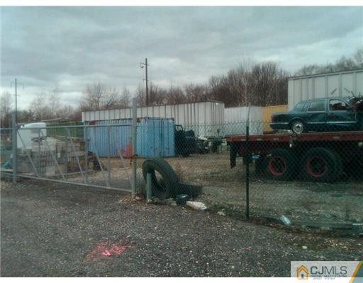 555 Old Water Works Road Old Bridge, NJ 08857 - Photo 2 of 12 a backyard of a house with table and chairs