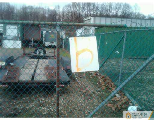 555 Old Water Works Road Old Bridge, NJ 08857 - Photo 3 of 12 a backyard of a house with table and chairs