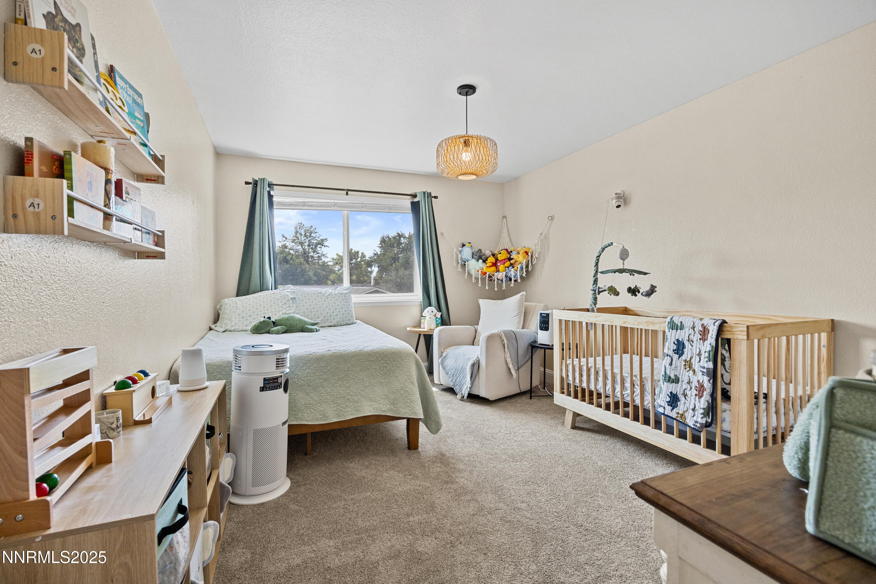 2138 Rizzo Drive Sparks, NV 89434 - Photo 14 of 24 a bedroom with furniture and a window