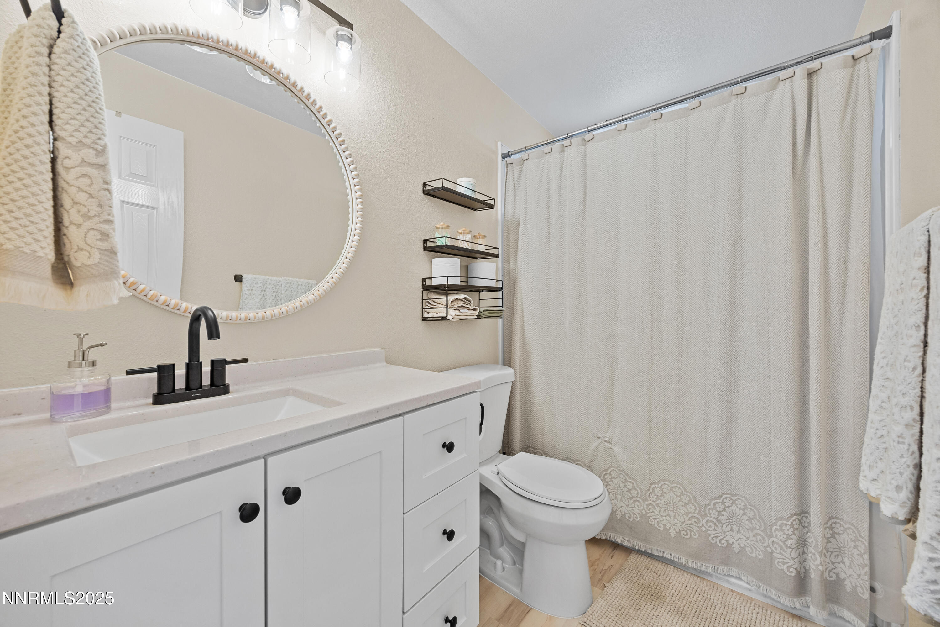 2138 Rizzo Drive Sparks, NV 89434 - Photo 16 of 24 a bathroom with a sink a toilet and shower
