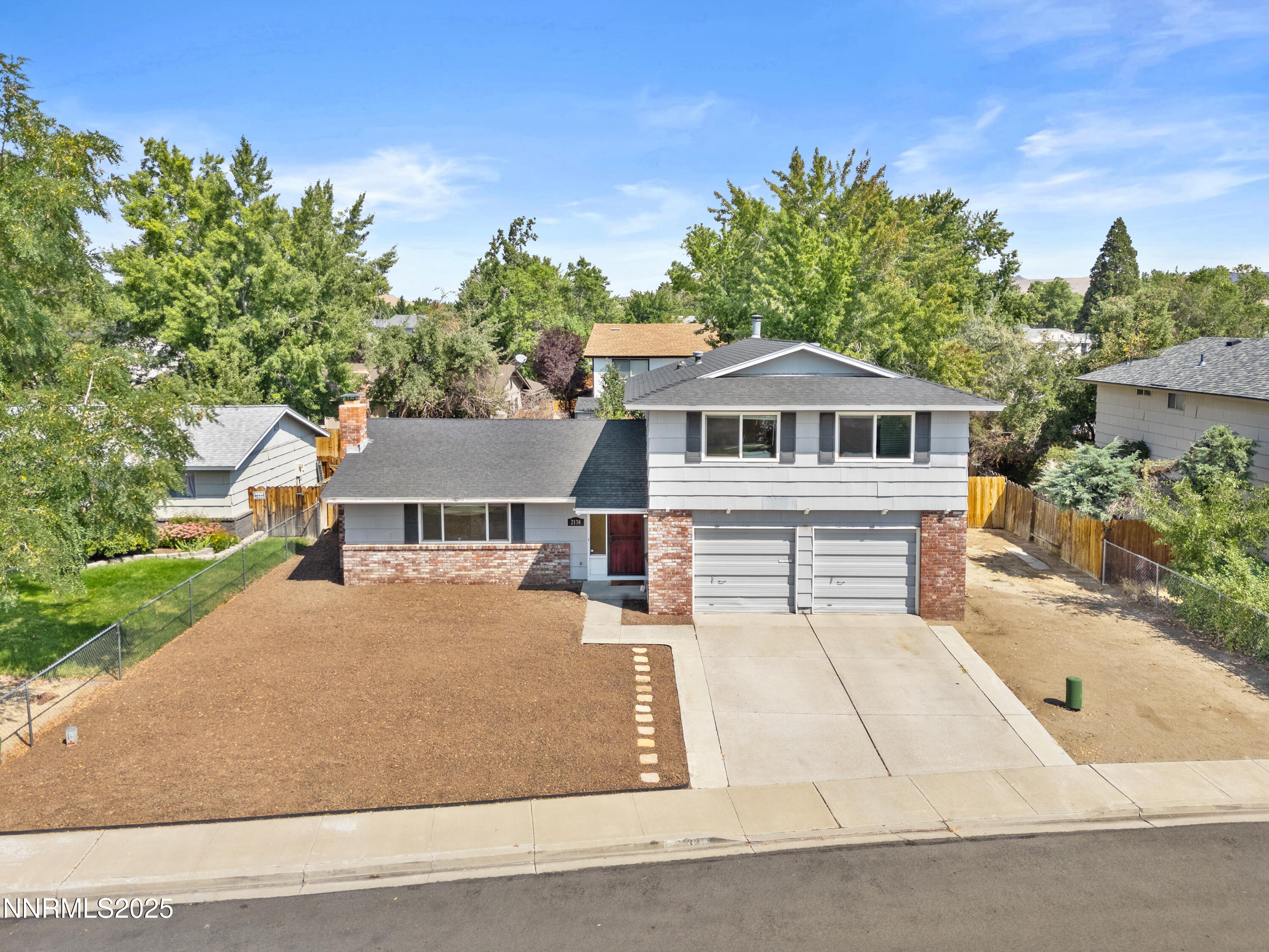 2138 Rizzo Drive Sparks, NV 89434 - Photo 20 of 24 front view of a house with a yard
