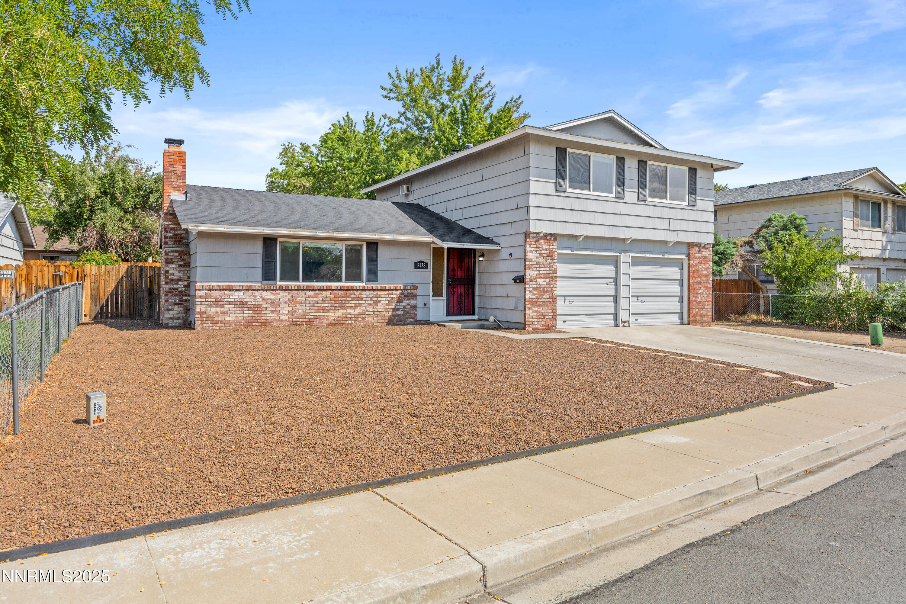 2138 Rizzo Drive Sparks, NV 89434 - Photo 2 of 24 a view of a house with a yard