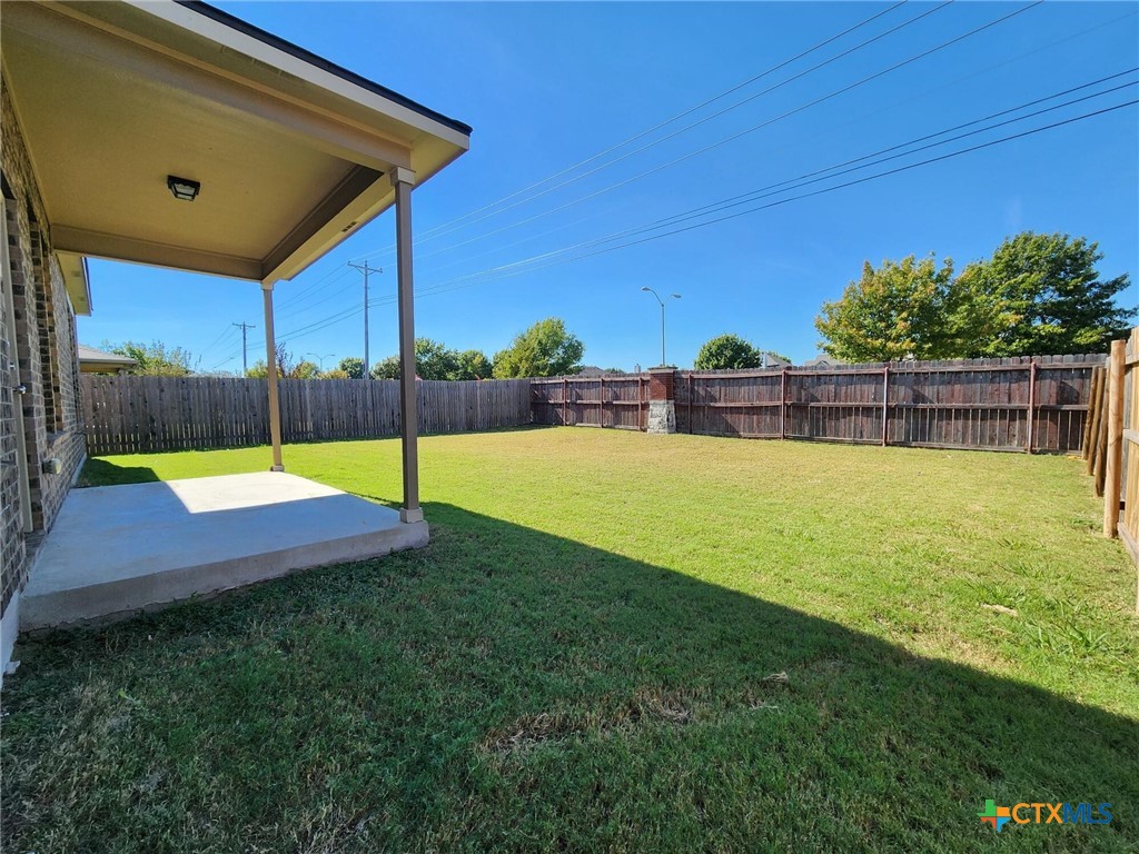 5822 Hopkins Drive Temple, TX 76502 - Photo 28 of 32 a view of a backyard with swimming pool