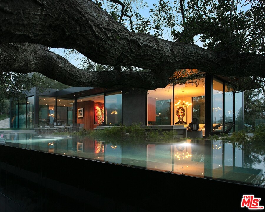 a view of swimming pool from a balcony