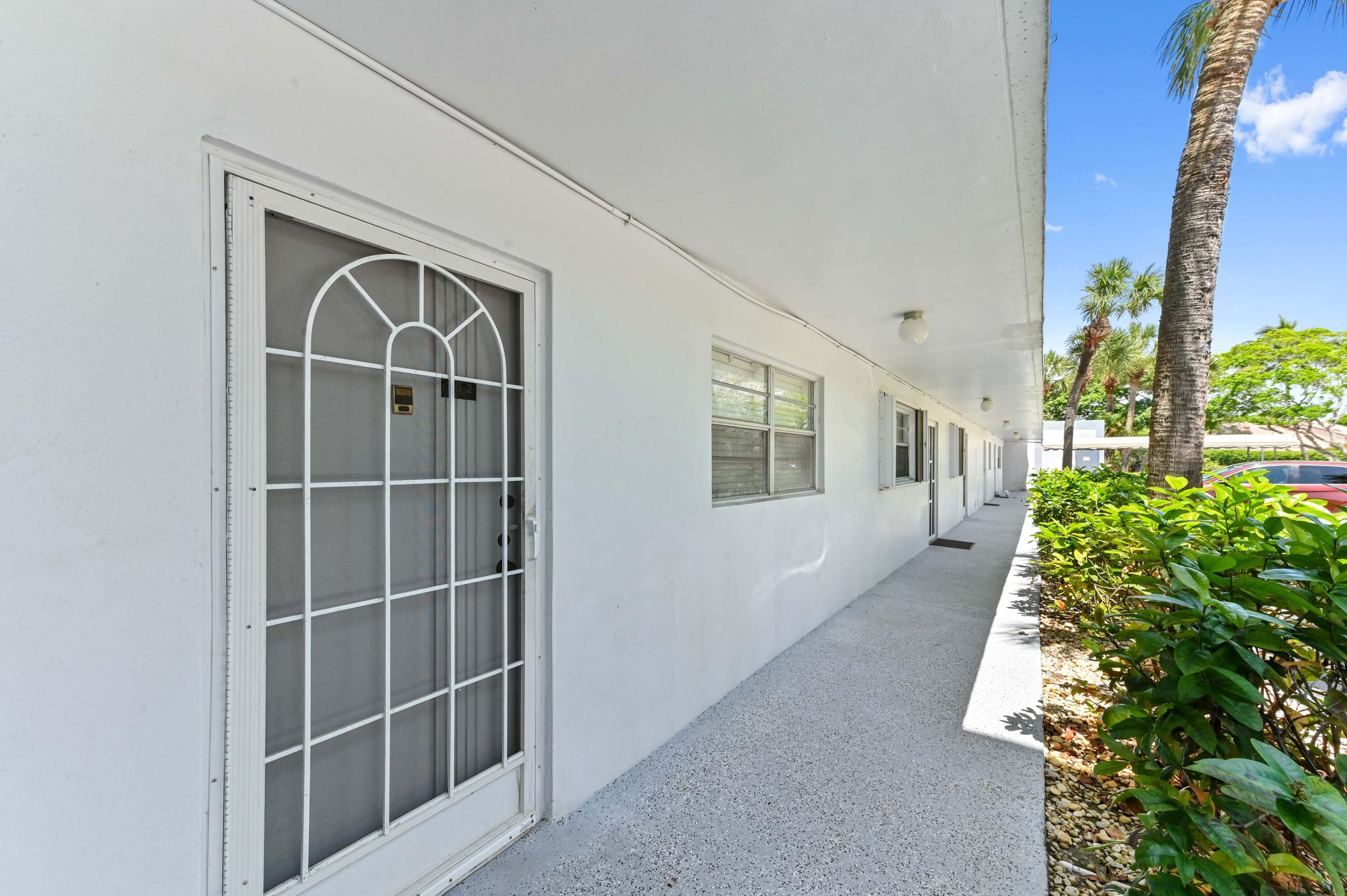 198 Northwest 67th Street, Unit 102 Boca Raton, FL 33487 - Photo 3 of 34 Entry