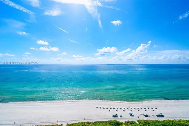 a view of a big yard of grass and an oven