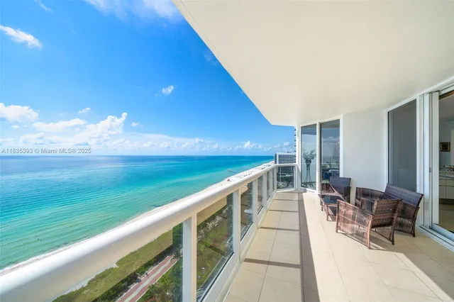 a view of balcony with furniture