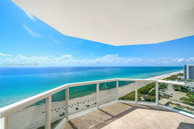 a view of balcony with ocean view