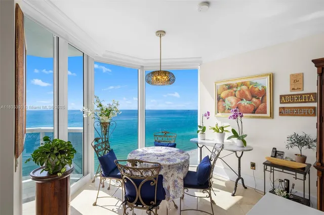 a view of a dining room with furniture window and outside view