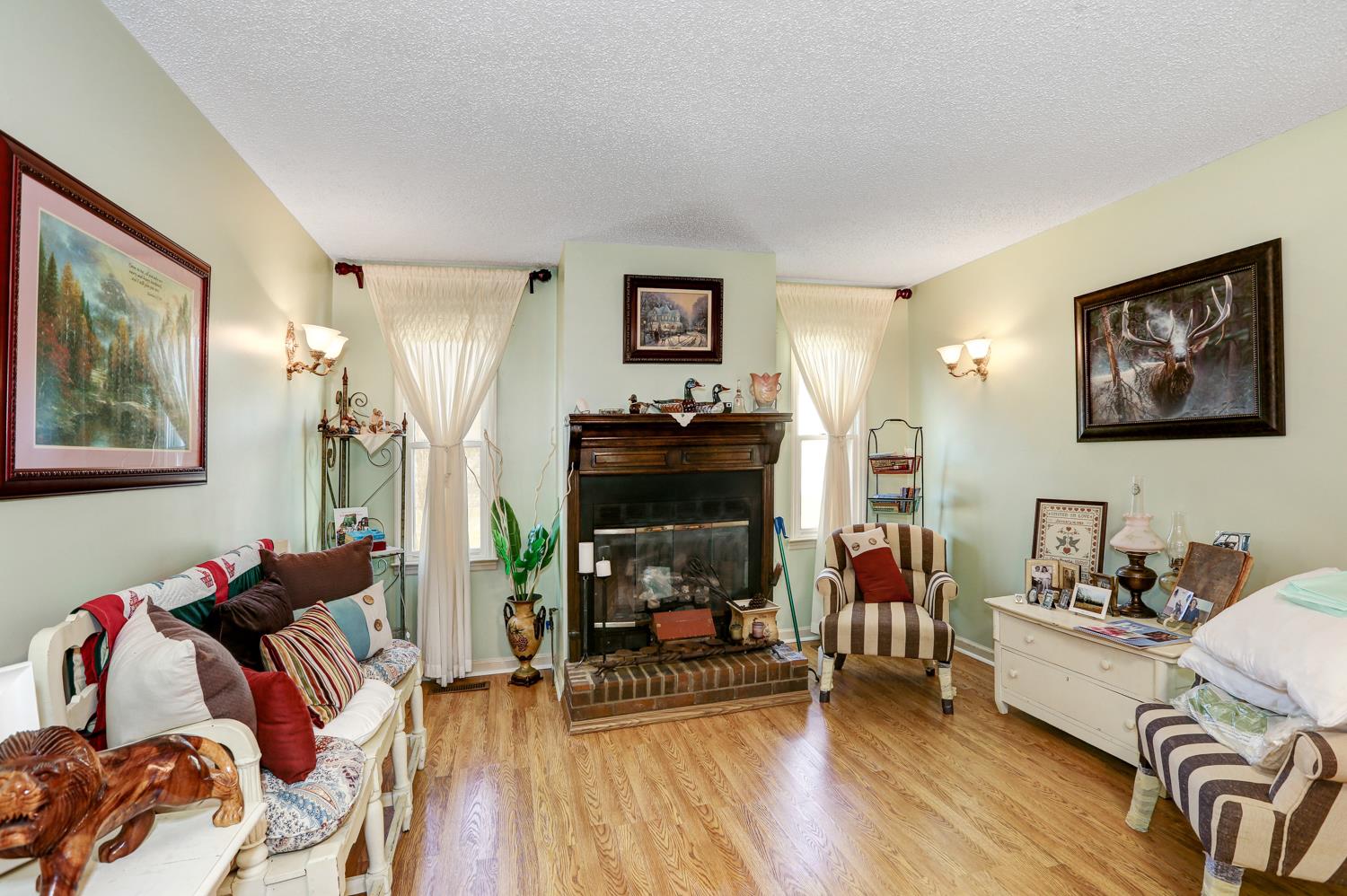 2345 Crescentview Road Pulaski, TN 38478 - Photo 2 of 23 a living room with furniture and a fireplace